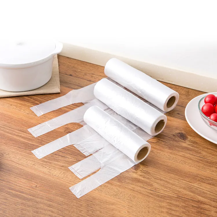 Custom printed clear hdpe ldpe t-shirt plastic food packaging roll bag shopping plastic carrier food bag on roll for supermarket